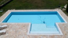 pavimento in palladiana di onice esterno piscina
